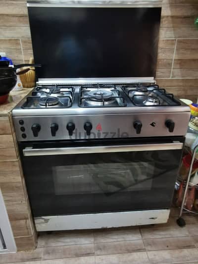 5 stove top gas oven, with rotary action oven. URGENT SALE