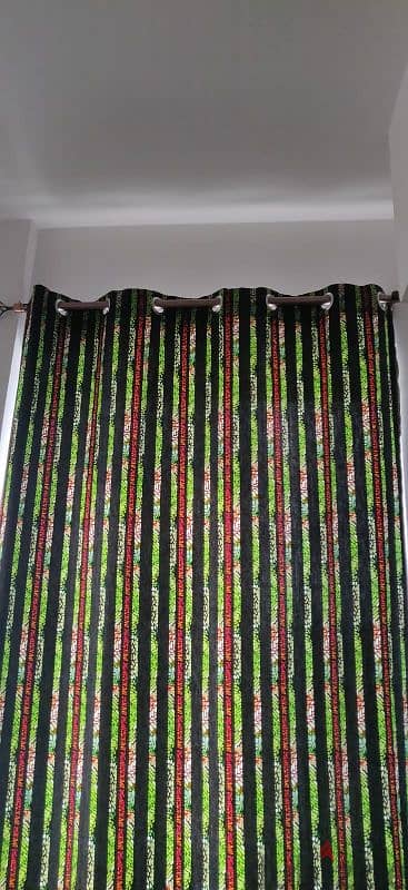 5 curtain cloths and 3 metal rods for sale