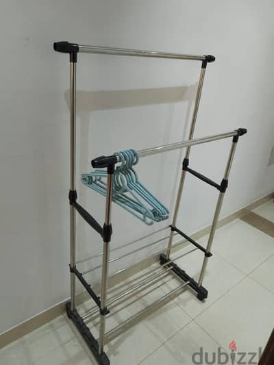 Two garment racks for sale