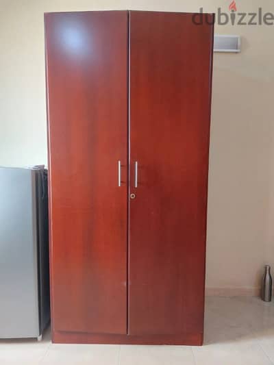 Wardrobe with hanging rod