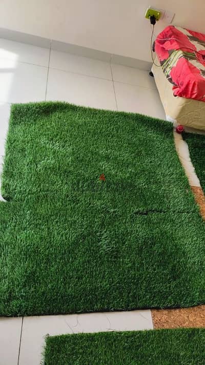 Green artificial lawn