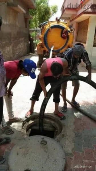 cleaning septic tank and block pipe open