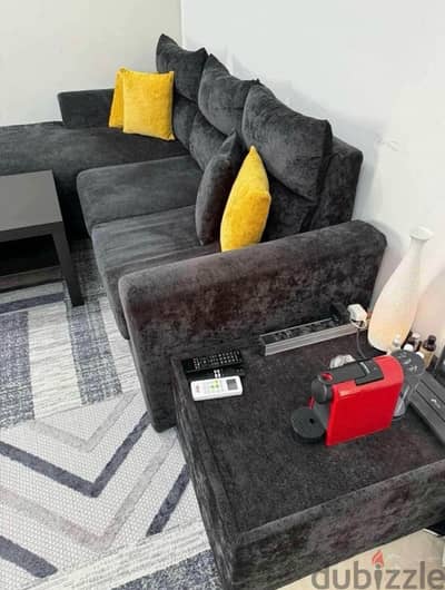 L shape sofa with table