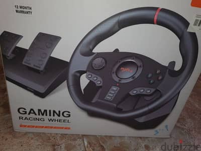 Pxn v900 gaming racing wheel for sale only 40 omr