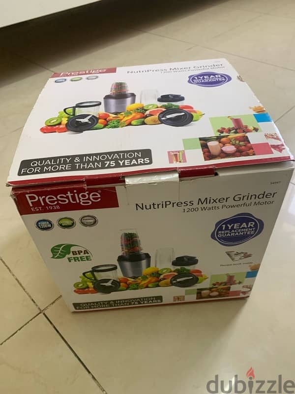 Prestige NutriPress Mixer Grinder 1200 watts with 12 Piece Set. 1