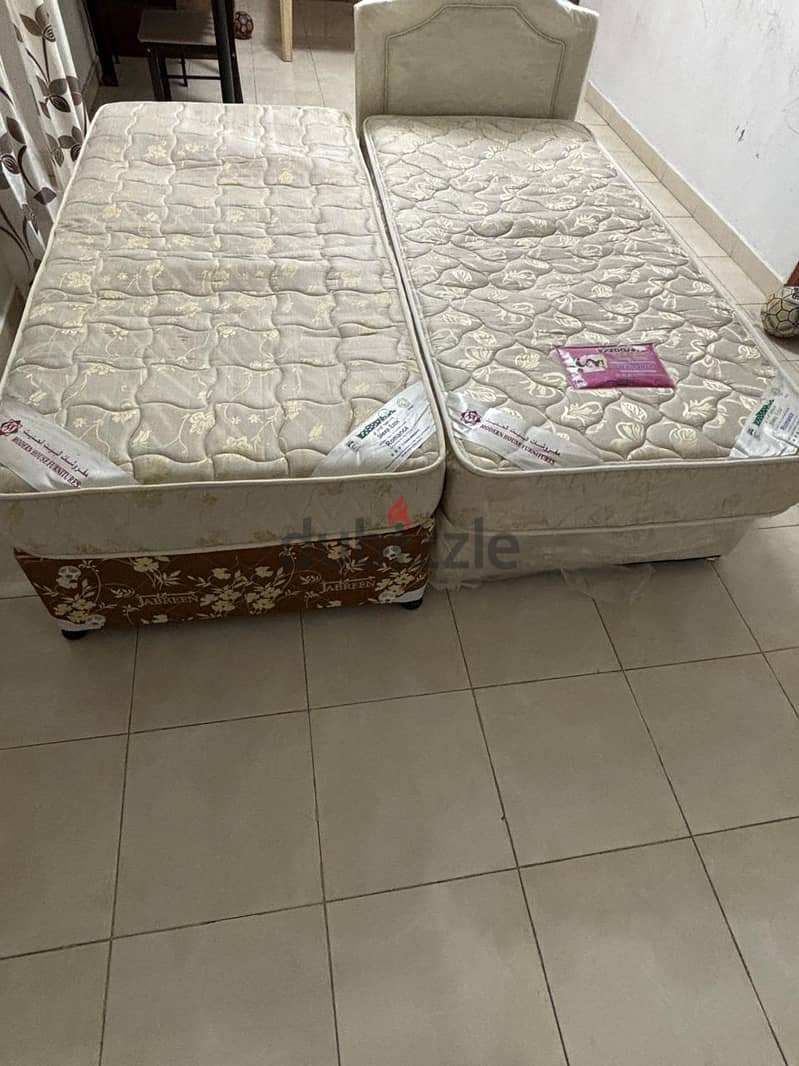 Single bed with matress. . 2 beds 1