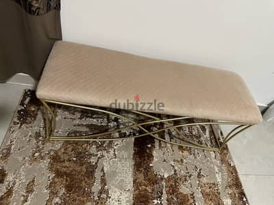 beige bench and white lamp