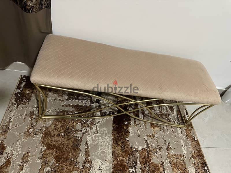 beige bench and white lamp 0