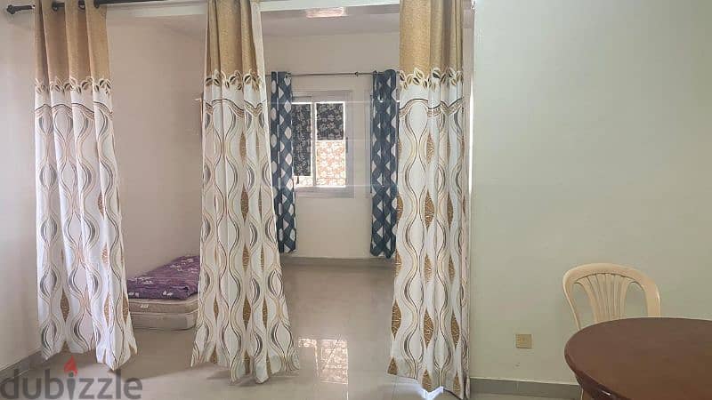 Room for rent near al meera supermarket Al khuwair 1