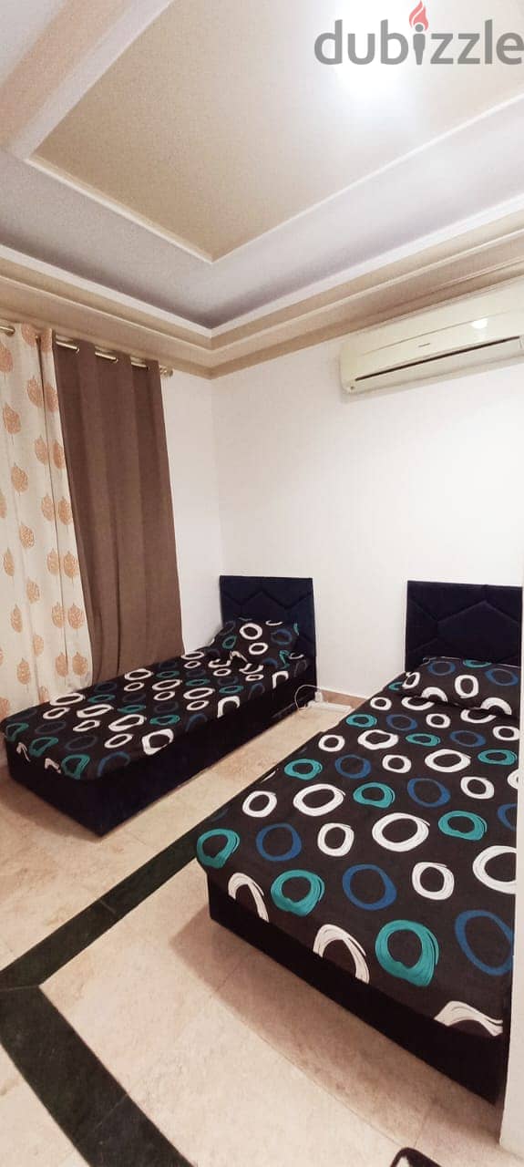 Exclusive new bed space for rent in Al Ghubrah main road 1