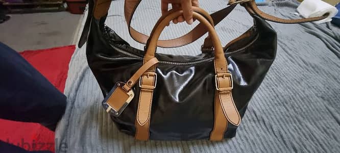 hand carry bag with hand bag less used