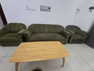 Sofa and heavy wooden center table to sell