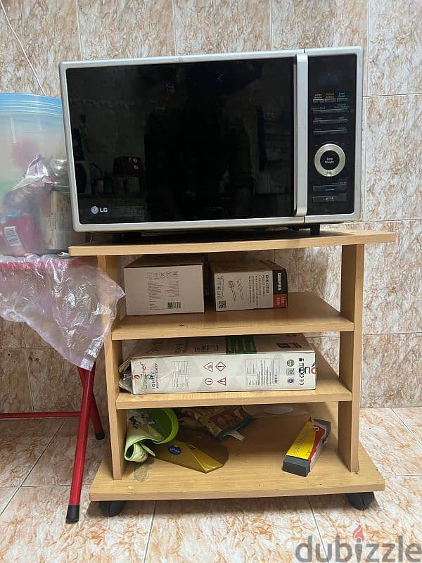 Microwave  RO 10/- and Convection oven with wheel stand RO 25/- 1