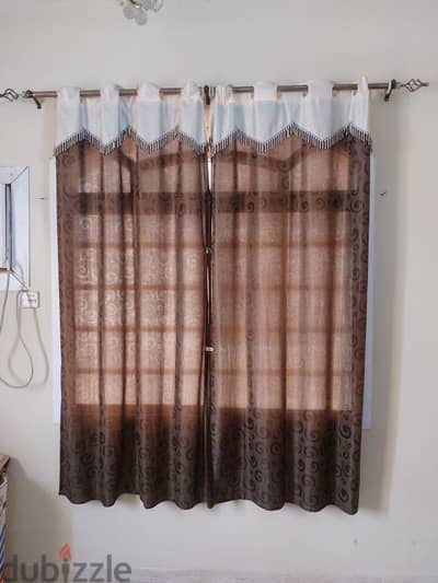 Curtain rods with curtains