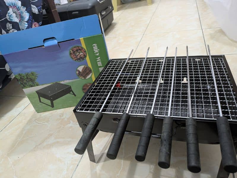 Portable BBQ grill with stick 1