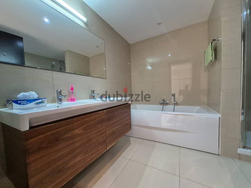 2 BR Furnished Apartment Overlooking the Pool & Garden | Al Mouj 9