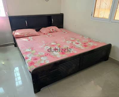 Double Bed with mattress and other household items