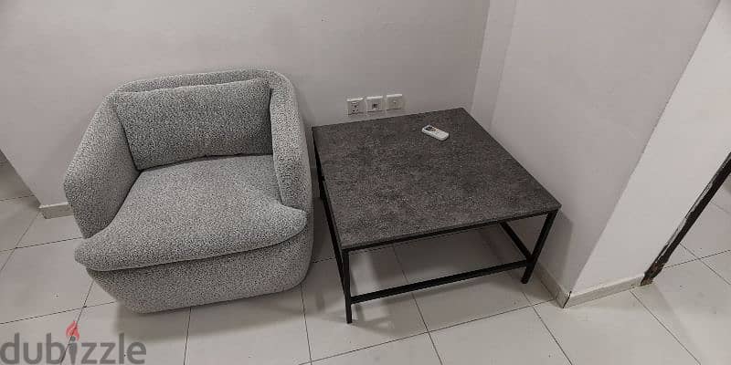 single sofa + coffee table for sale 0