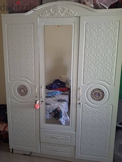 3 door wooden cupboard with mirror