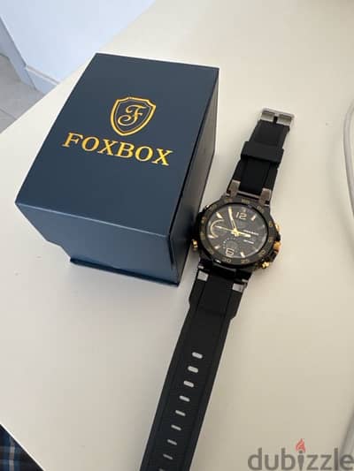 Golden and black Foxbox watch