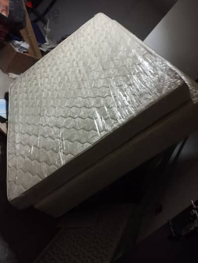 double bed with mattress. . . almost new