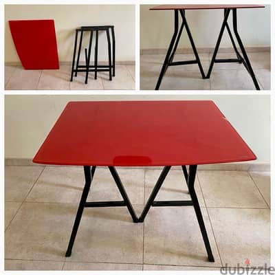 Red glass with metals folded stand table for sale