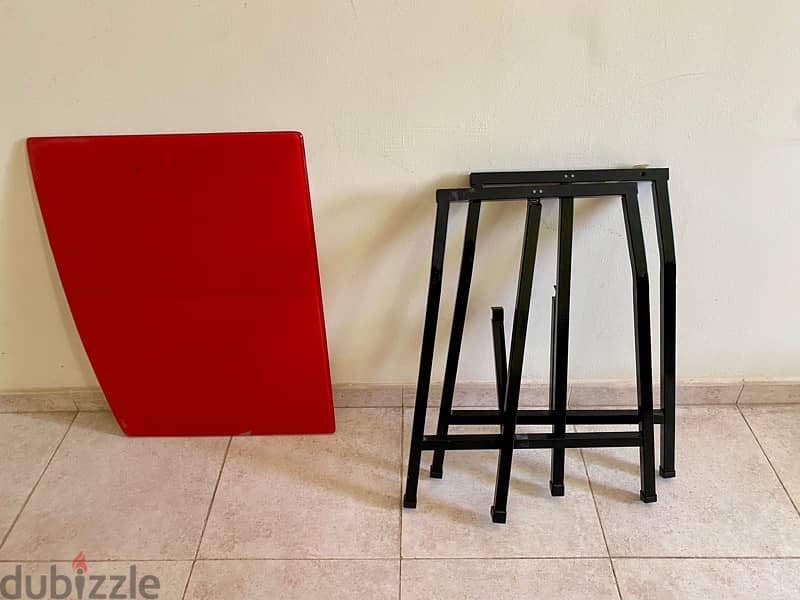 Red glass with metals folded stand table for sale 1