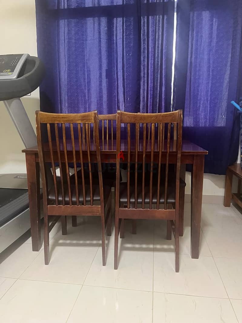 Table with 4 chairs for sale 2