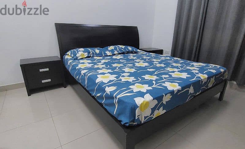 Double bed with mattress and two side tabless 1