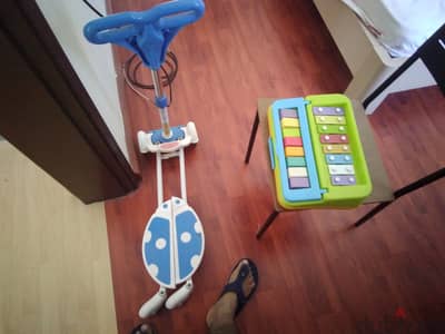 Xylophone (musical toy) and push bicycle