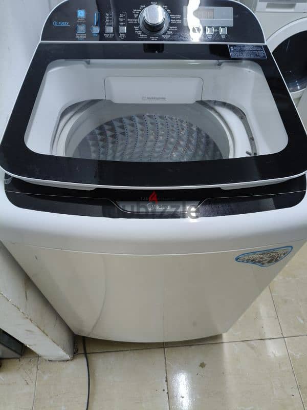 midea 13 kgwashing machine for sale in good condition 0