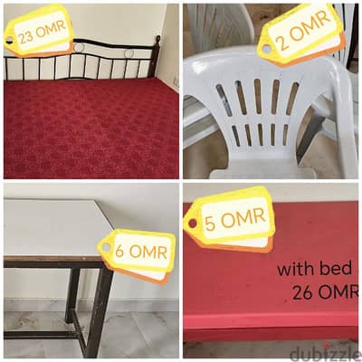 king size iron bed, Large red table, 3 plastic chair, Wooden table