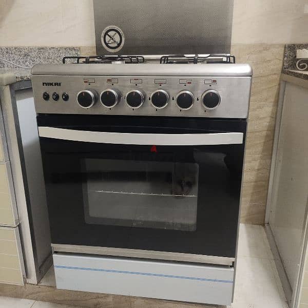 cooker with oven work with gasطباخ مع فرن يعمل بالغاز 1