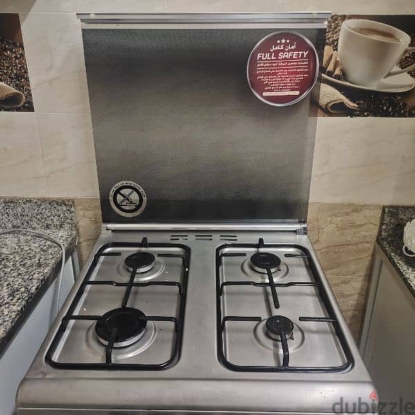 cooker with oven work with gasطباخ مع فرن يعمل بالغاز 8