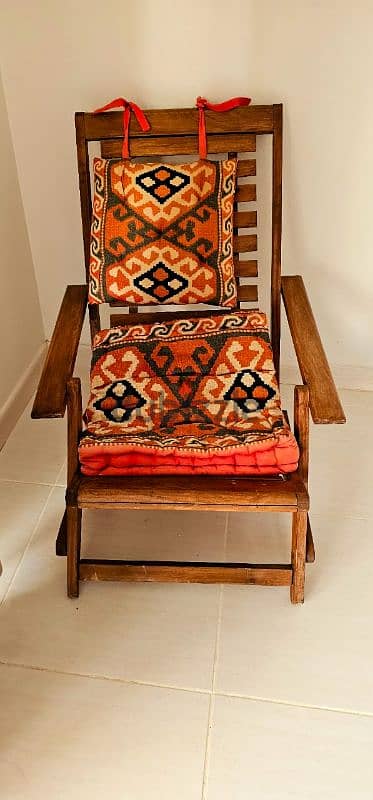 Chair with cushions and two side tables