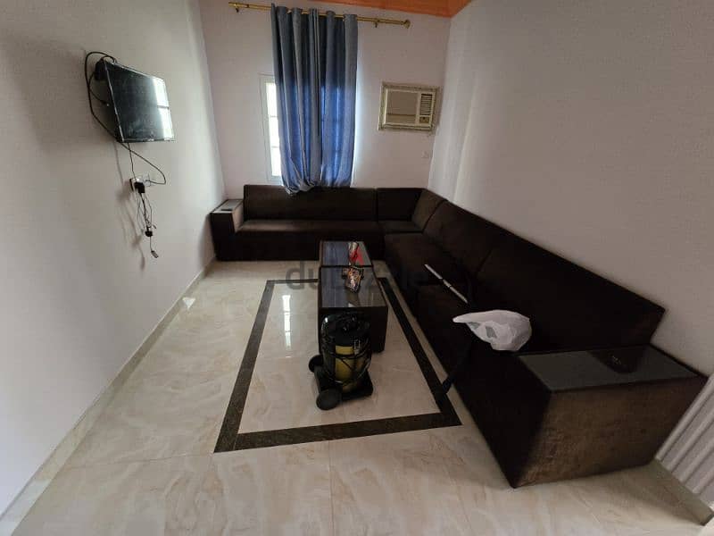 1 bachelor room for rent with balcony 65 rial, hall, kitchen furnished 1