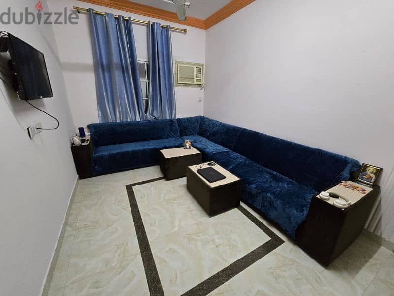 1 bachelor room for rent with balcony 65 rial, hall, kitchen furnished 2