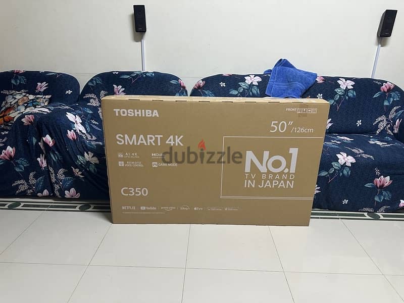 Toshiba 50 inch 4K TV (NEW) with TV unit Free 1