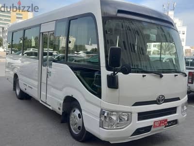 Toyota coaster bus available for rent with Ramadan offers