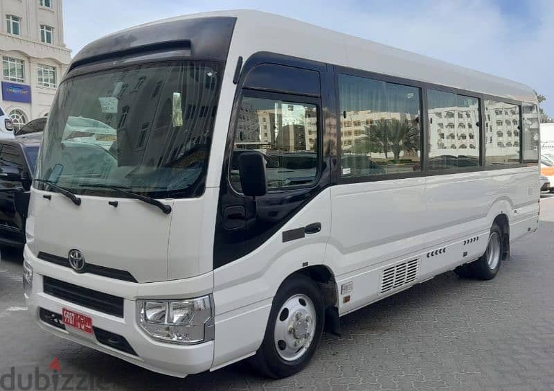 Toyota coaster bus available for rent with Ramadan offers 1