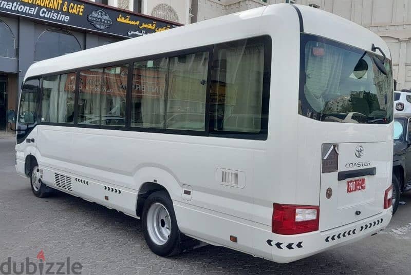 Toyota coaster bus available for rent with Ramadan offers 2