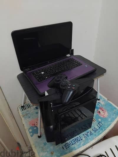 negotiable Laptop and ps3 combo only for 20 rial