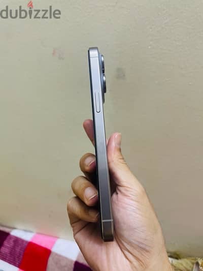 Urgent sell iPhone 15 pro max natural titanium Arabic version 256GB