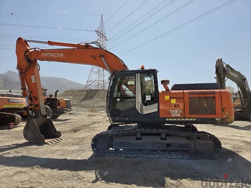 Hitachi excavator 240 with breaker 1