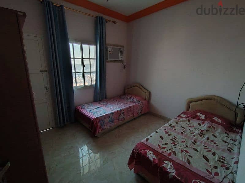 1 bachelor room for rent with balcony 65 rial, hall, kitchen furnished 5