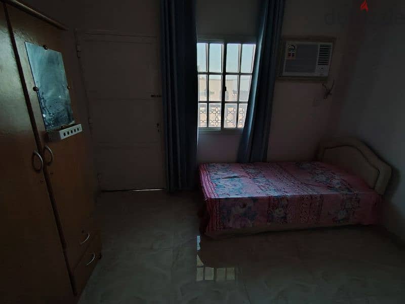 1 bachelor room for rent with balcony 65 rial, hall, kitchen furnished 6