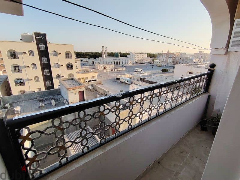 1 bachelor room for rent with balcony 65 rial, hall, kitchen furnished 8