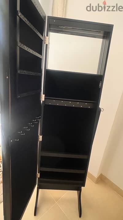 mirror with jewelry storage