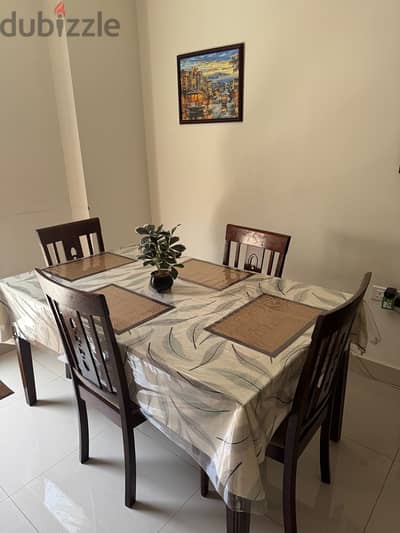 Expat leaving Oman, dining table with 6 chairs for sale