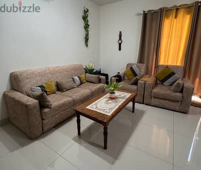 Expat leaving Oman sofa set with centre table for sale